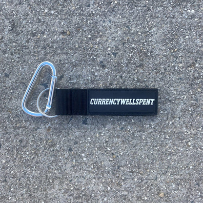 CURRENCYWELLSPENT KEYCHAIN